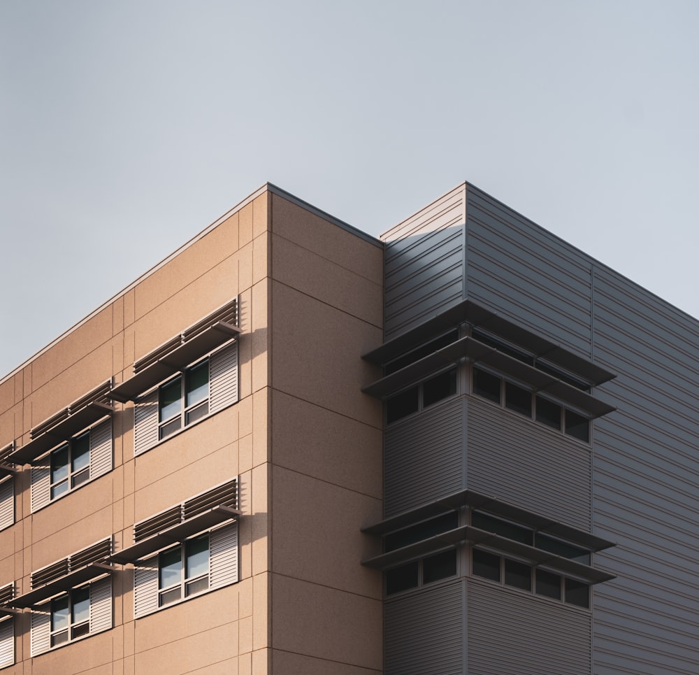 brown concrete building under white sky during daytime