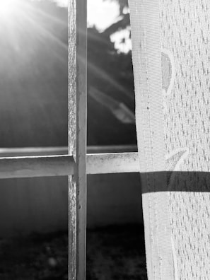 Sunlight streaming through windows onto kids engaged in creative play.