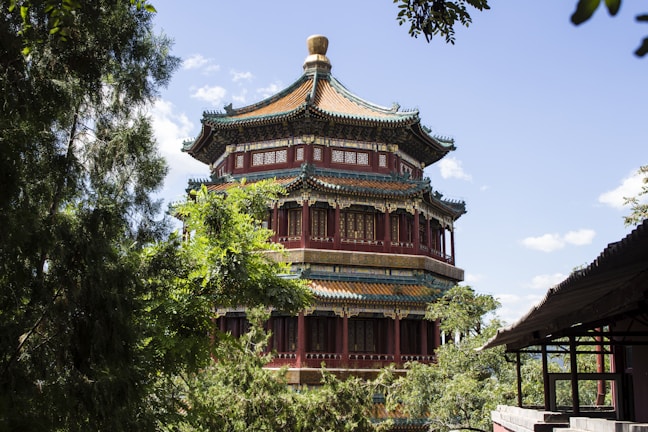 A picturesque pagoda surrounded by lush greenery.