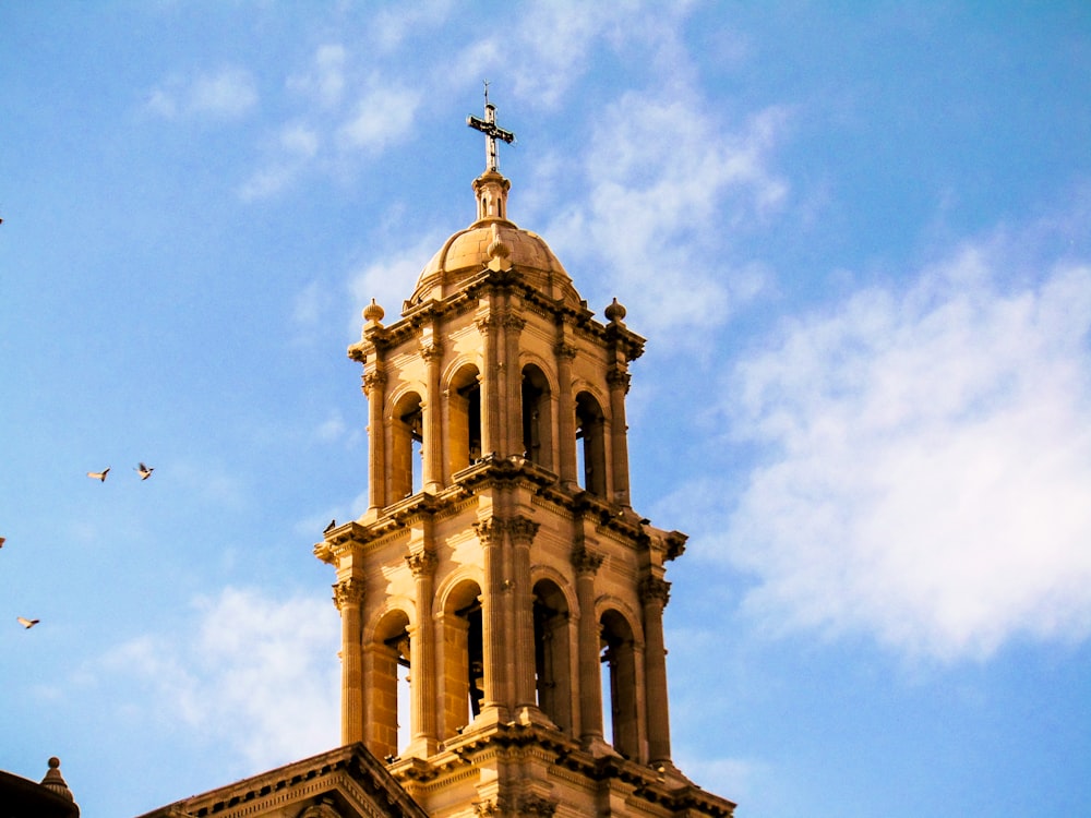 brown concrete church under blue sky during daytime