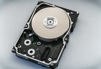 silver and black hard disk drive