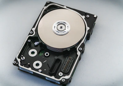 silver and black hard disk drive