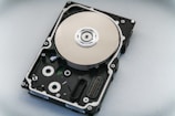 silver and black hard disk drive