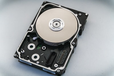 silver and black hard disk drive