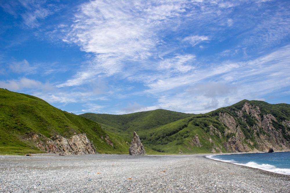 green mountain under blue sky during daytime