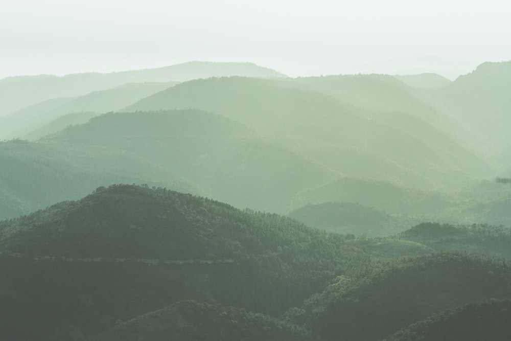 green mountains under white sky during daytime