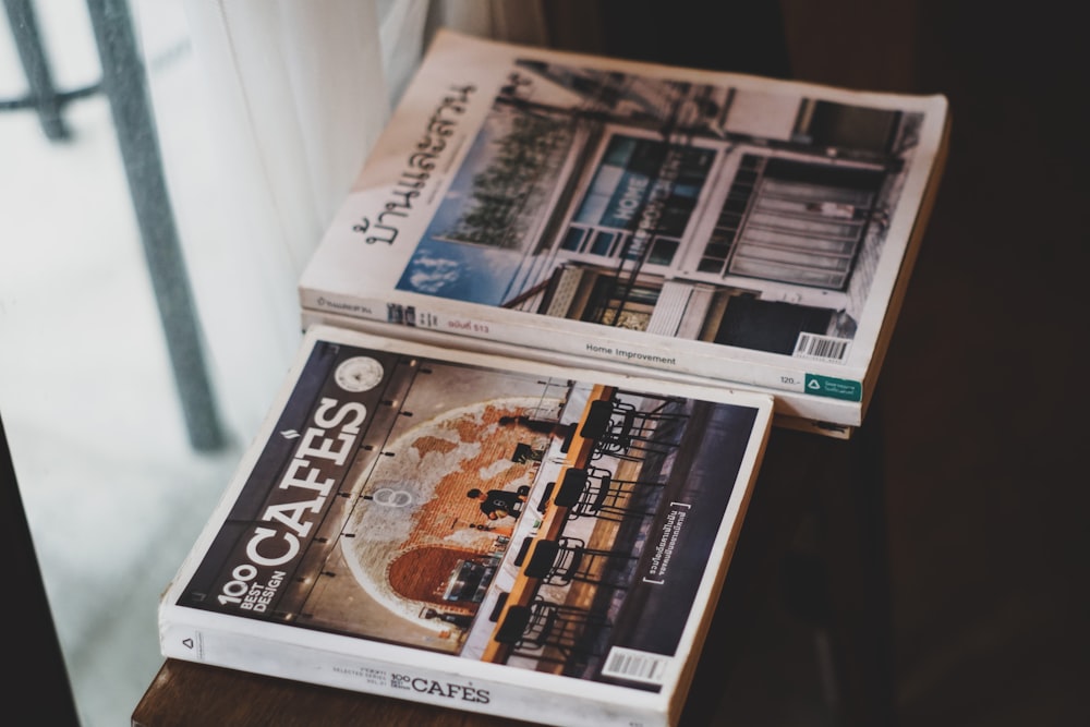 newspaper on white wooden shelf