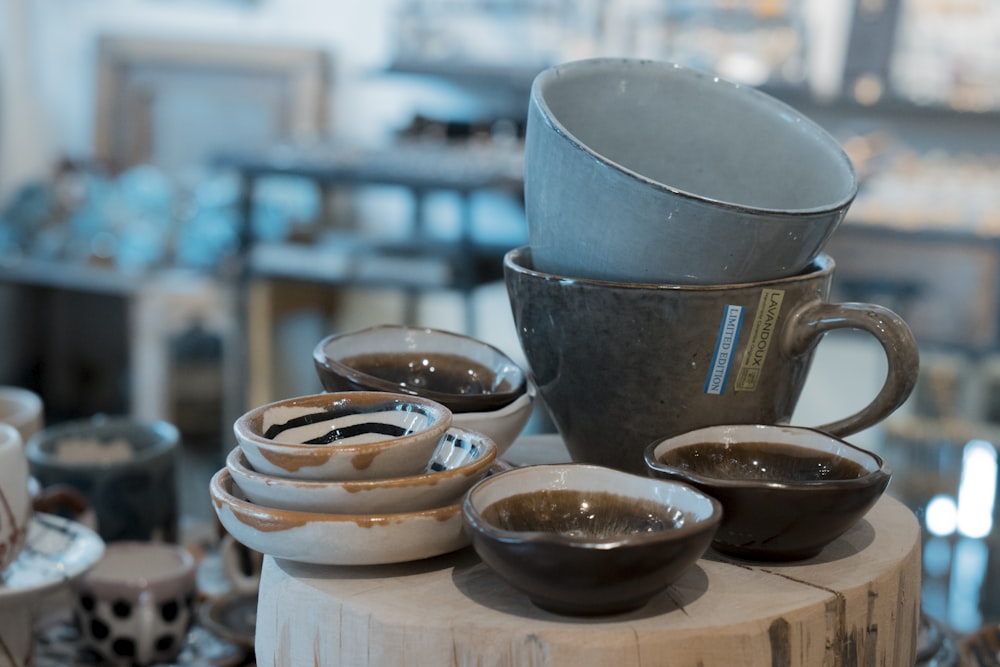 blue ceramic bowl on brown wooden table