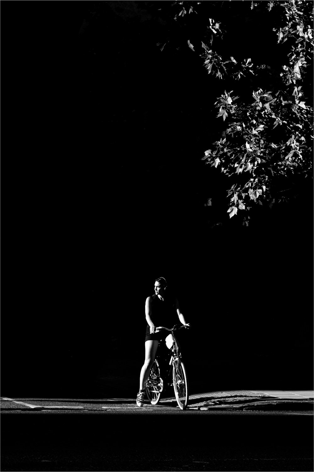 grayscale photo of woman in black dress