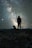 silhouette of man and dog standing on rock during night time