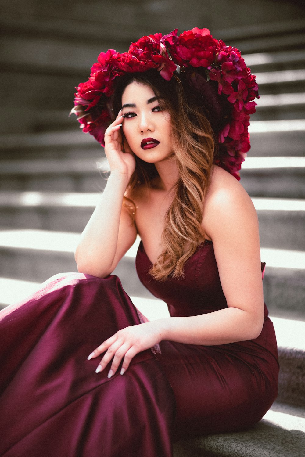 woman in red sleeveless dress