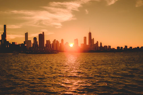 A warm golden-hued photo of the San Francisco skyline at sunset, reflecting the creative spirit of Contemplate Today.