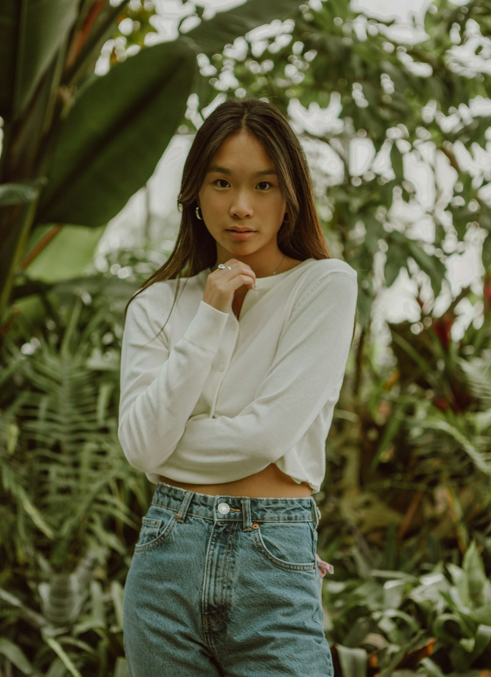 woman in white long sleeve shirt and blue denim shorts