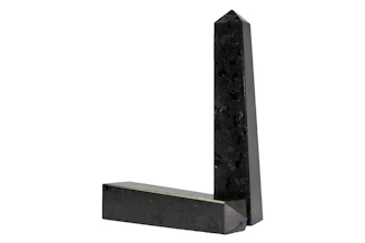 Obsidian-like black monoliths standing tall in shadow, exuding an aura of impenetrable corporate defense.