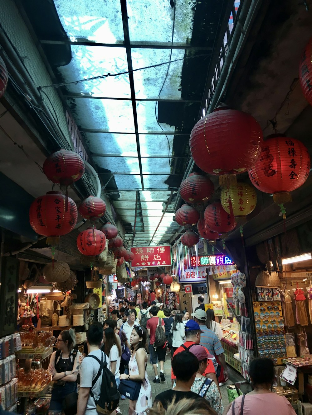 people walking on market during daytime