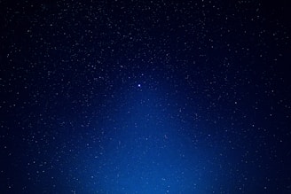 blue sky with stars during night time