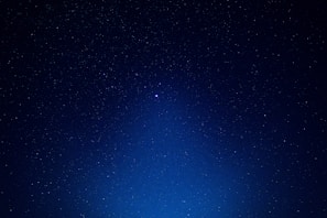 blue sky with stars during night time