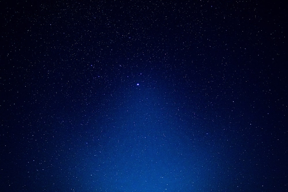 blue sky with stars during night time