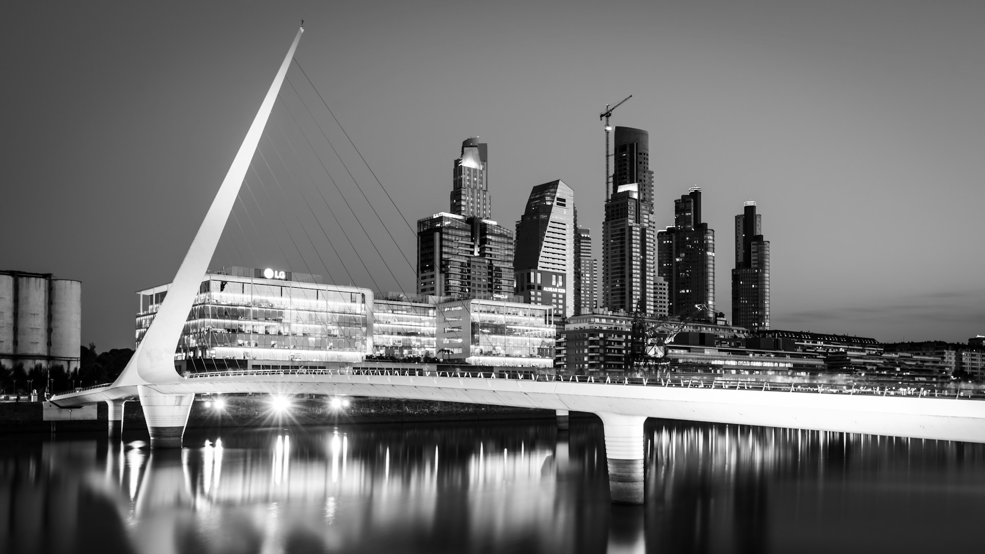 grayscale photo of city skyline during night time