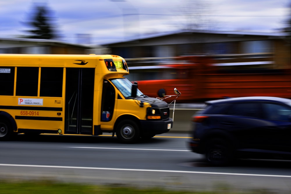 yellow school bus on road during daytime