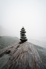 stack of stones on a foggy weather