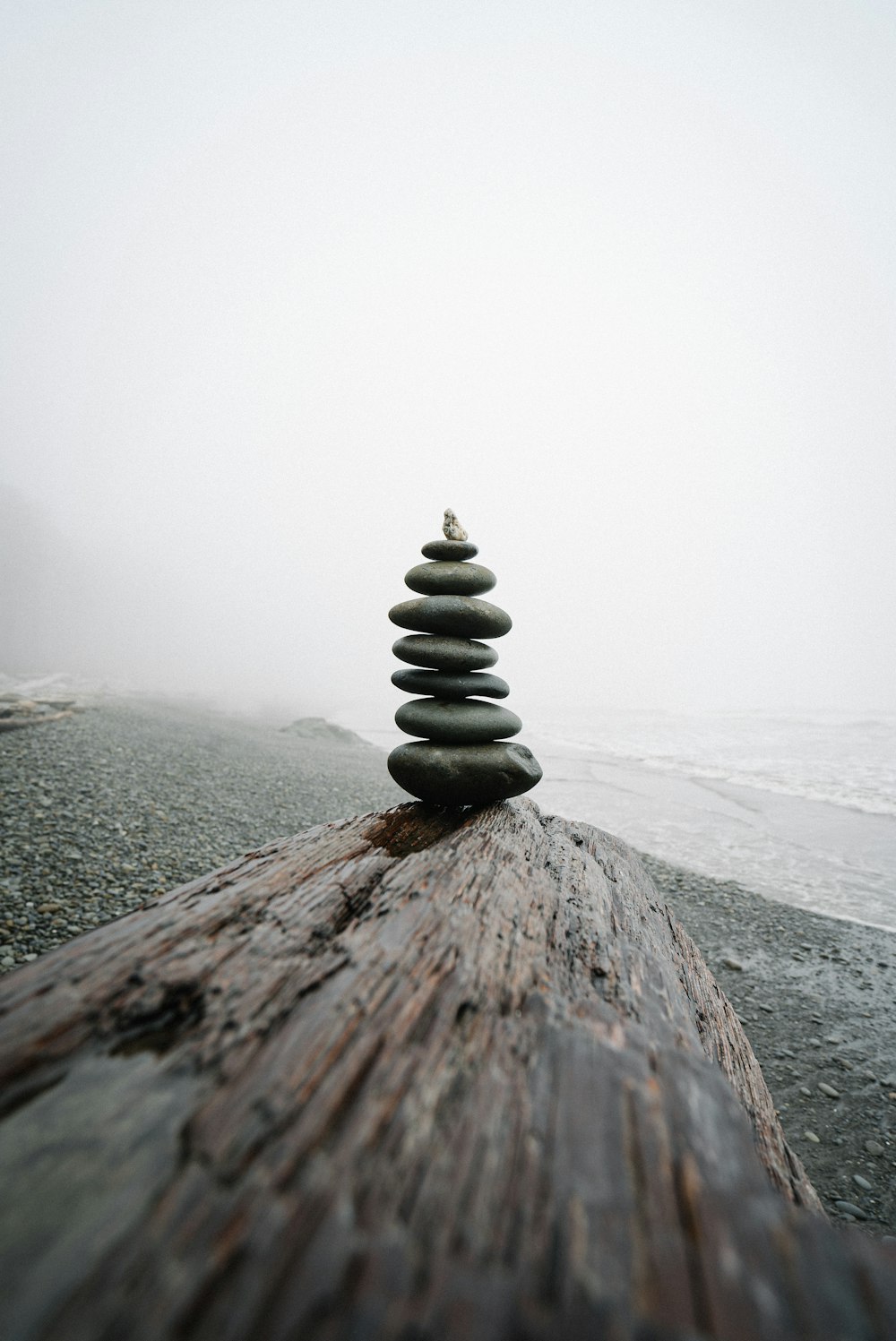 stack of stones on a foggy weather