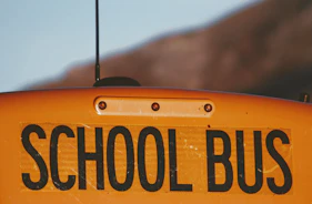 yellow and black school bus