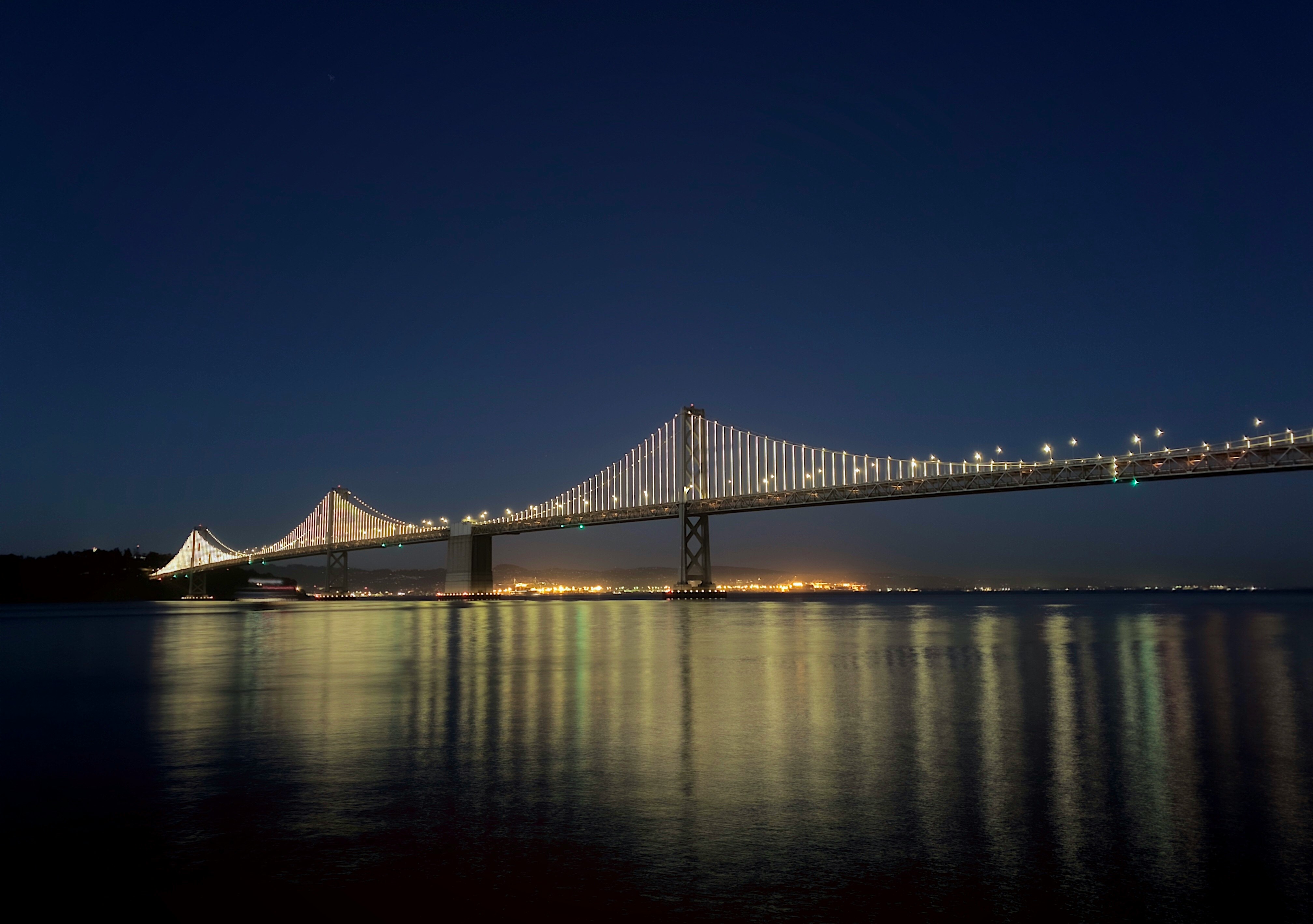 Bay Bridge, lit up at night. Pushing the limits of mobile photography minimizing noise at night.