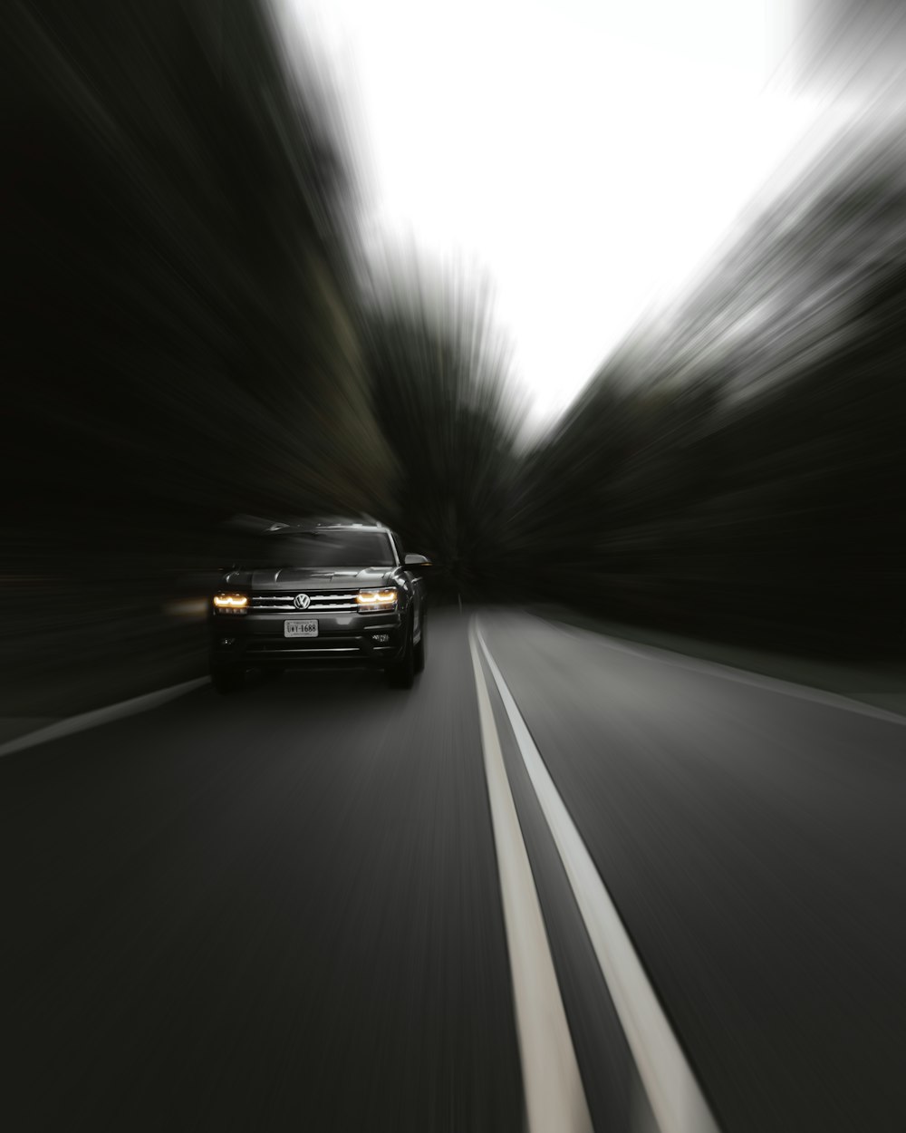 black car on road during daytime