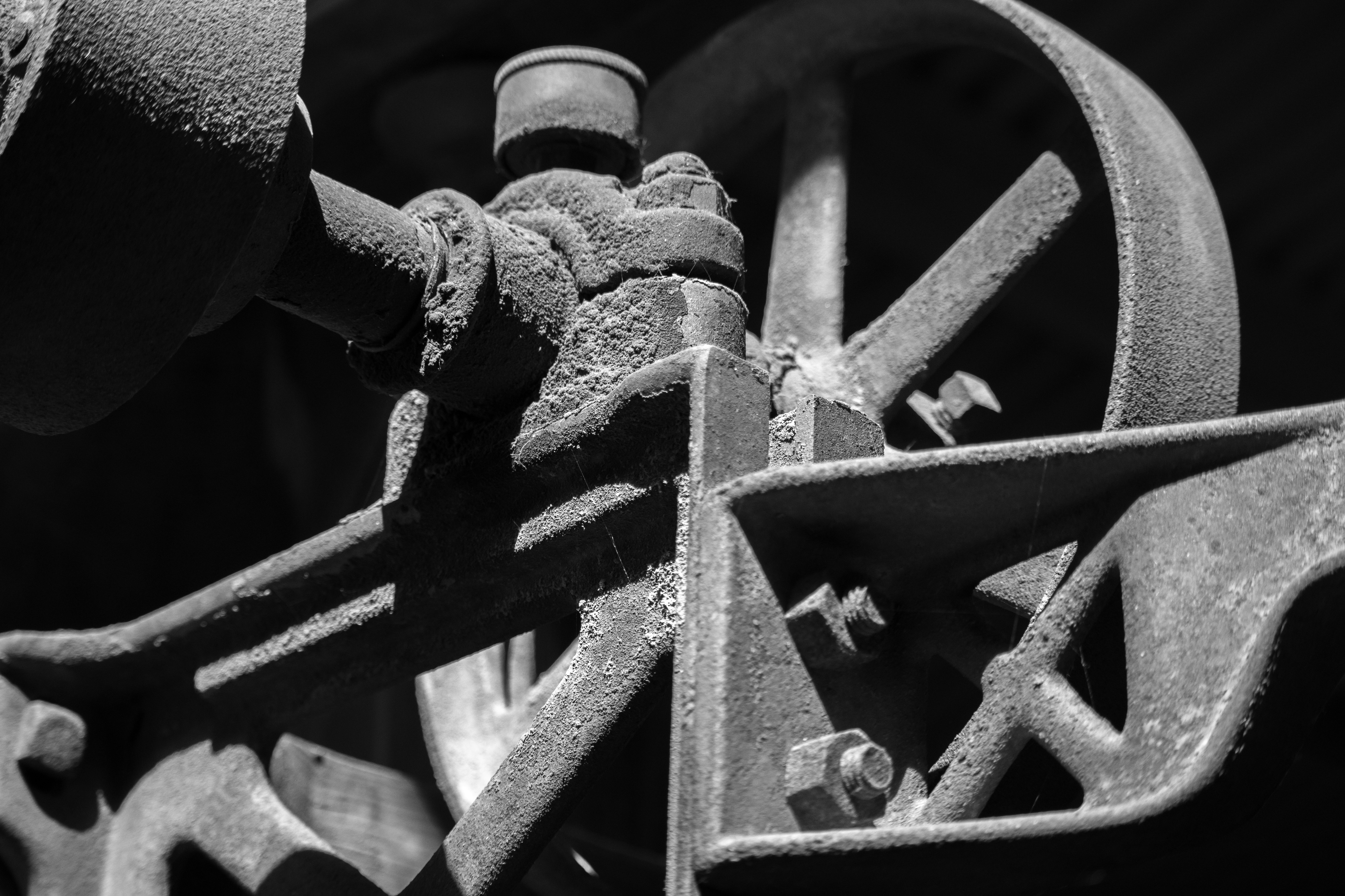 grayscale photo of metal pipe