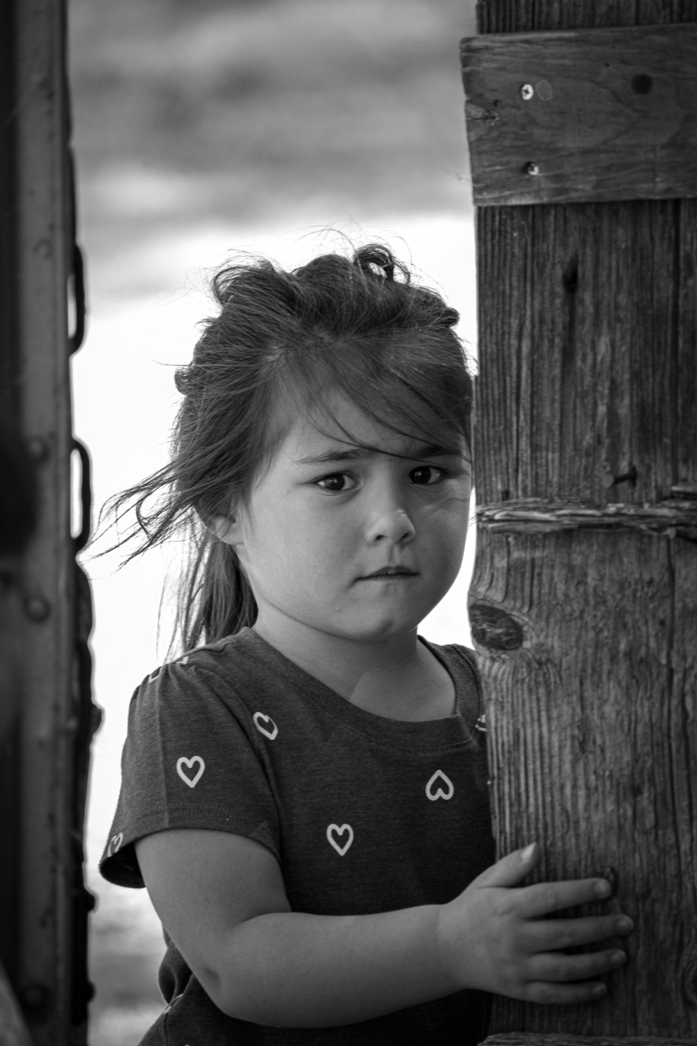 grayscale photo of girl in crew neck shirt