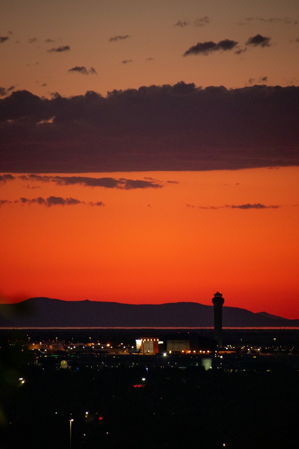 silhouette of city buildings during sunset