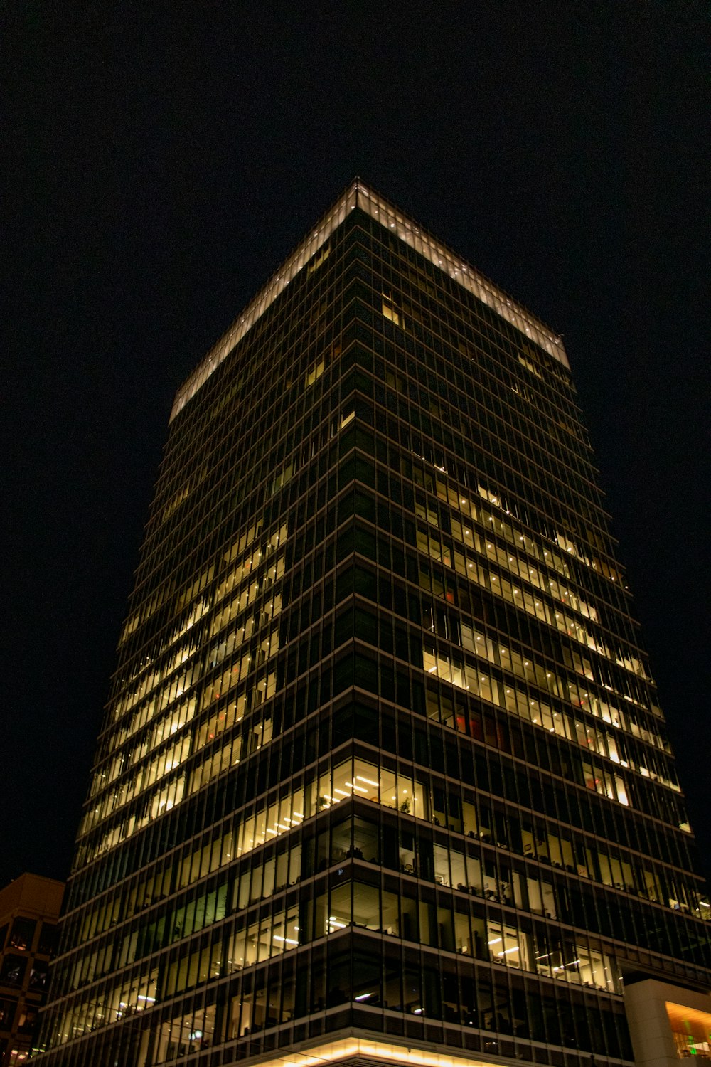 gray concrete building during night time