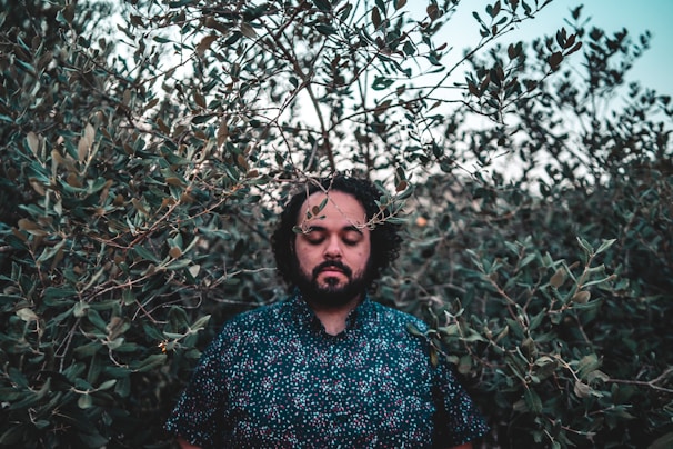 A serene moment of reflection with eyes closed, immersed in the rhythm of biodanza.