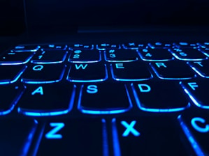black and blue laptop computer