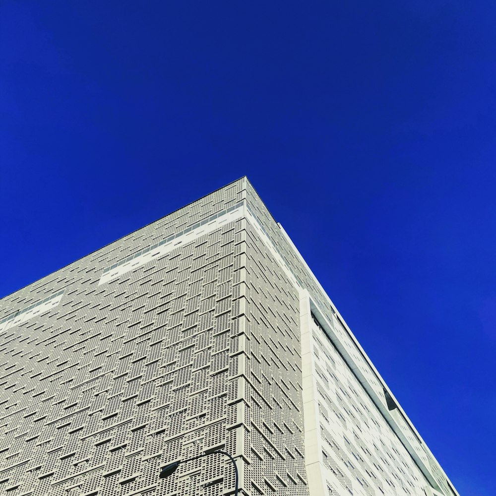 gray concrete building under blue sky during daytime