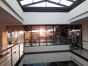 A close-up of sparkling clean windows reflecting sunlight in a modern home.