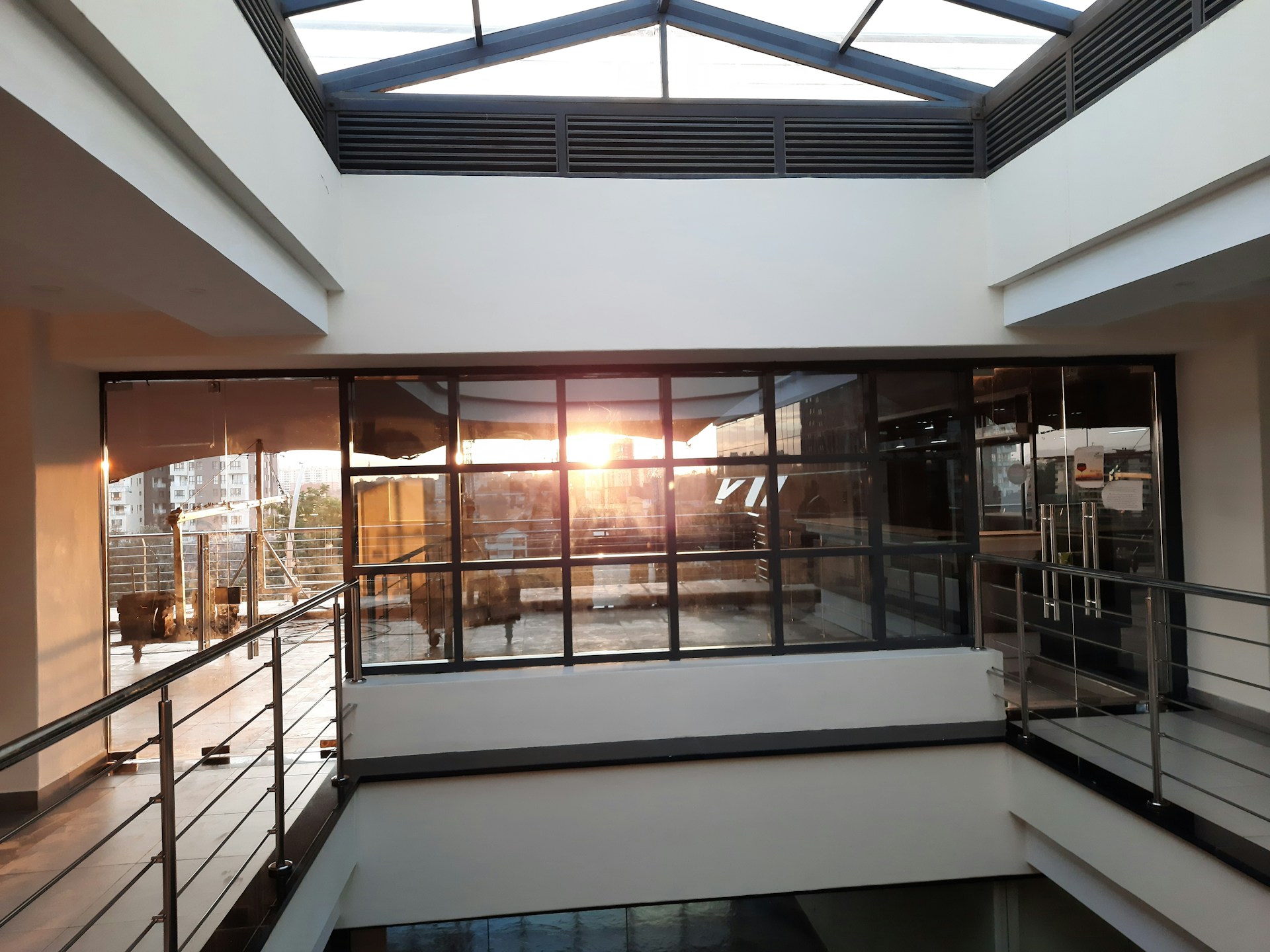 woman wearing yellow long-sleeved dress under white clouds and blue sky during daytime