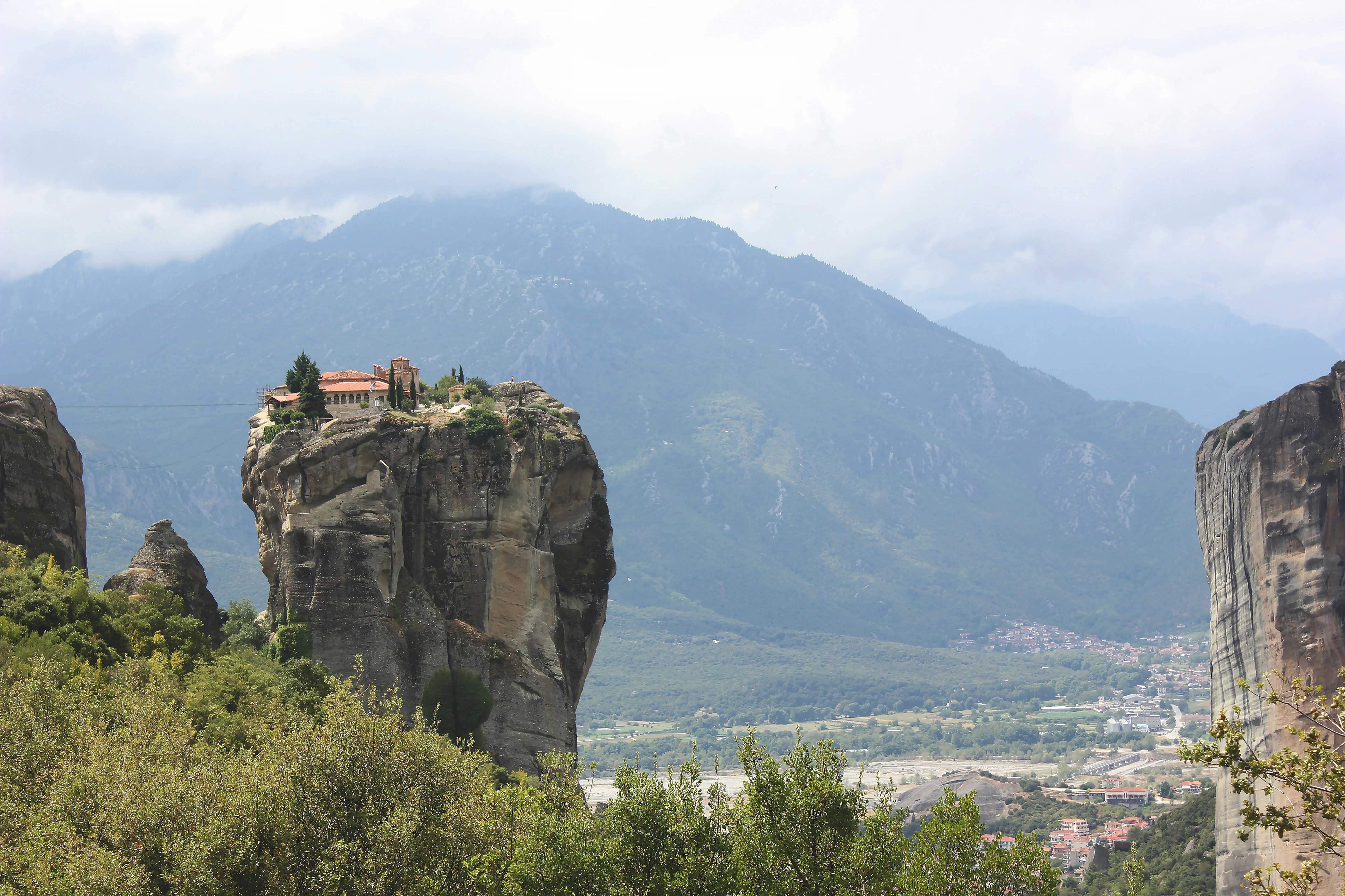 green trees on mountain during daytime, The Meteora monastery