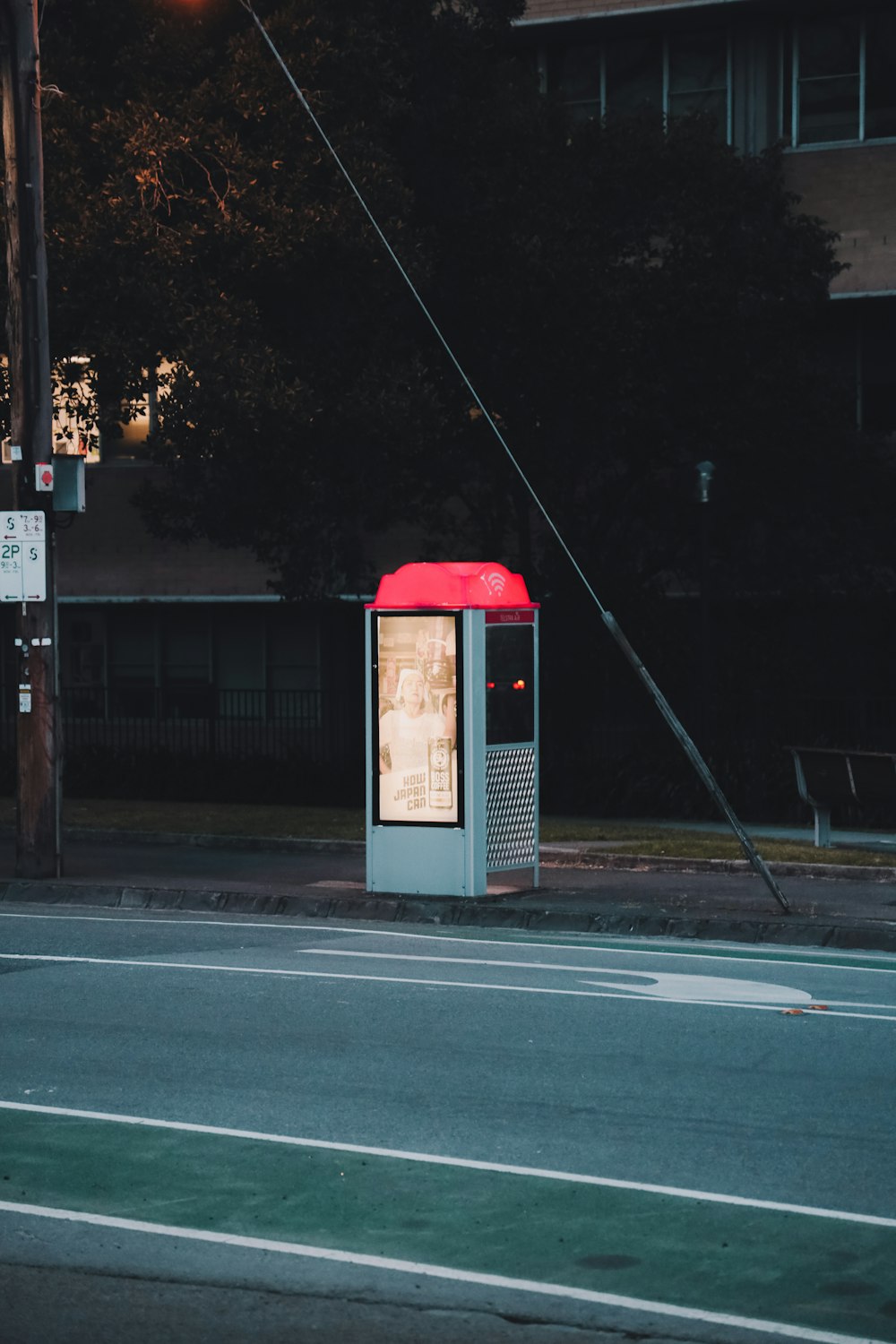 red and gray telephone booth