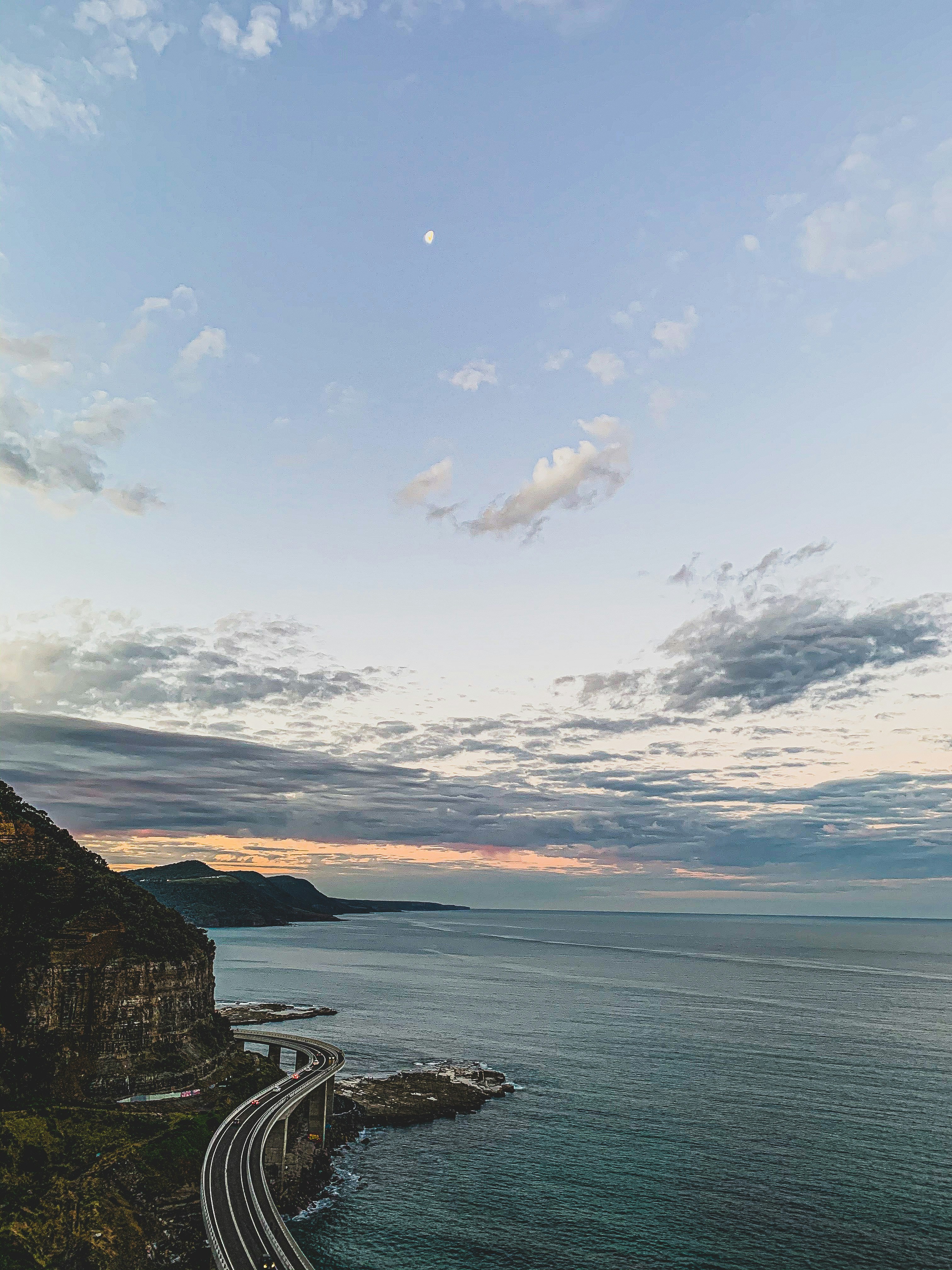 body of water under blue sky during daytime