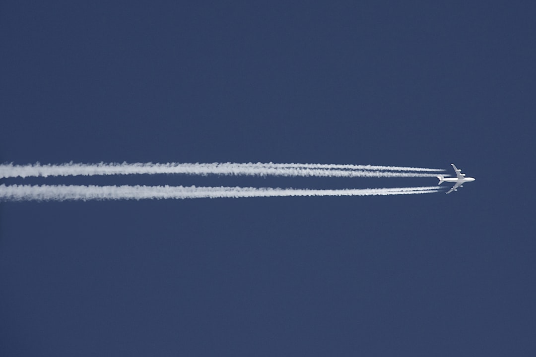 white plane in the sky