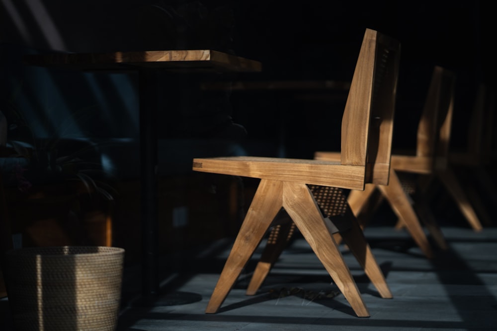 brown wooden chair on black wooden floor