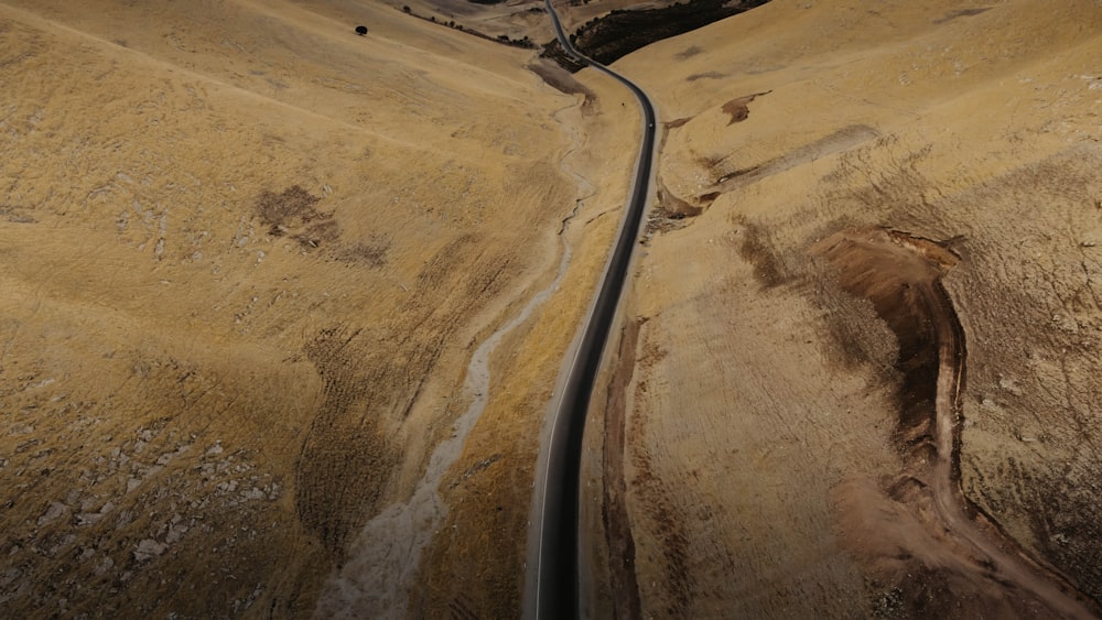 brown sand with black metal railings