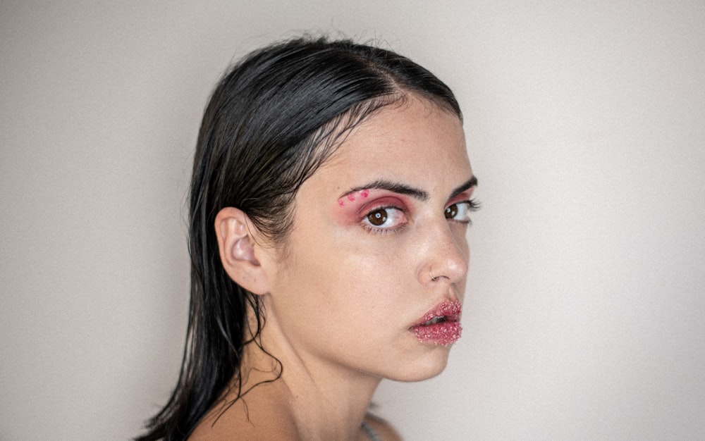 woman with black hair and red lipstick