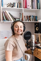 A friendly customer service representative speaking on a headset.