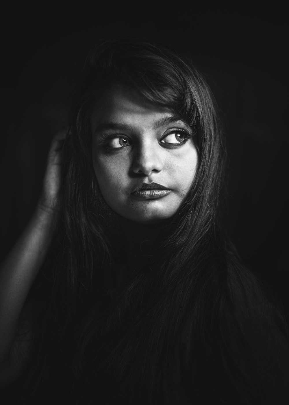 grayscale photo of womans face