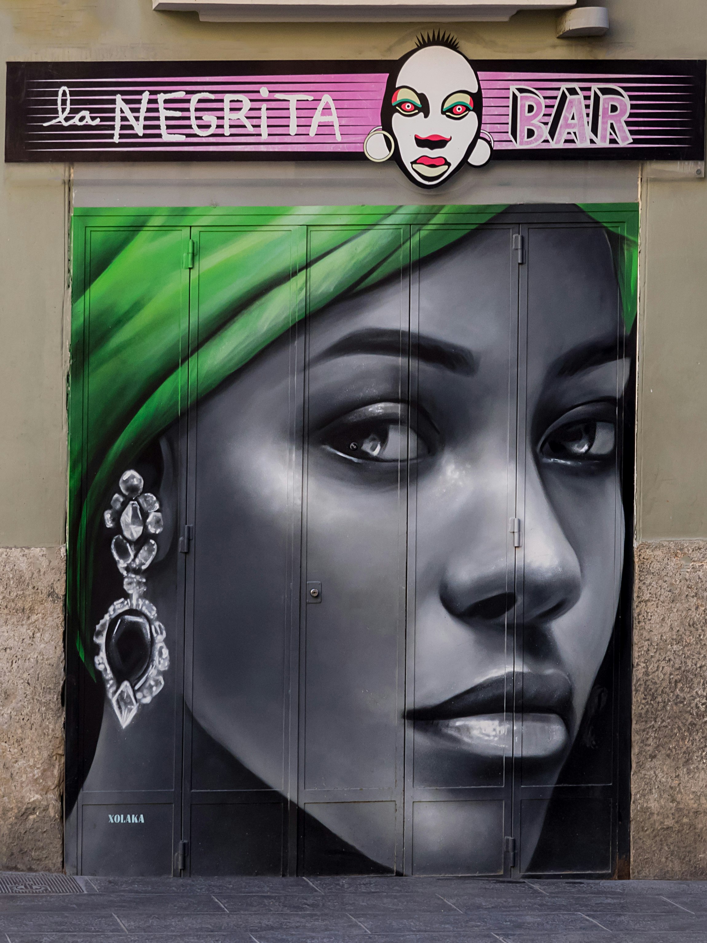 black and green wooden door