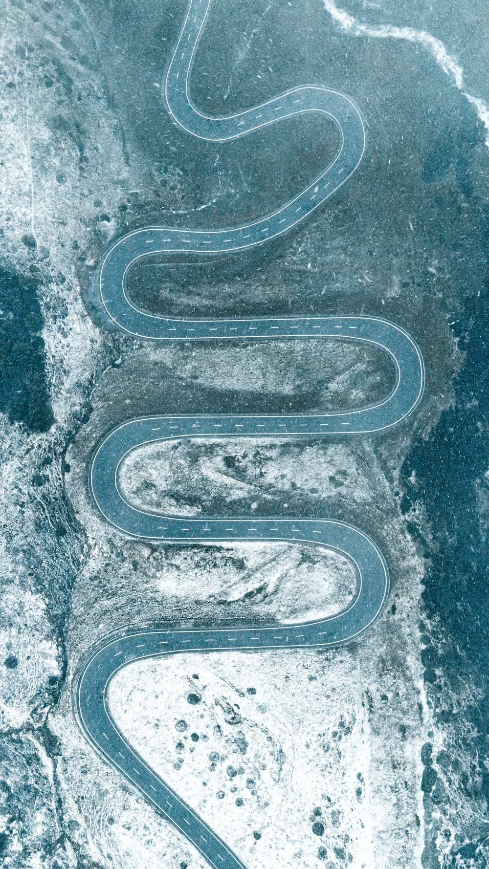 aerial view of brown and white sand