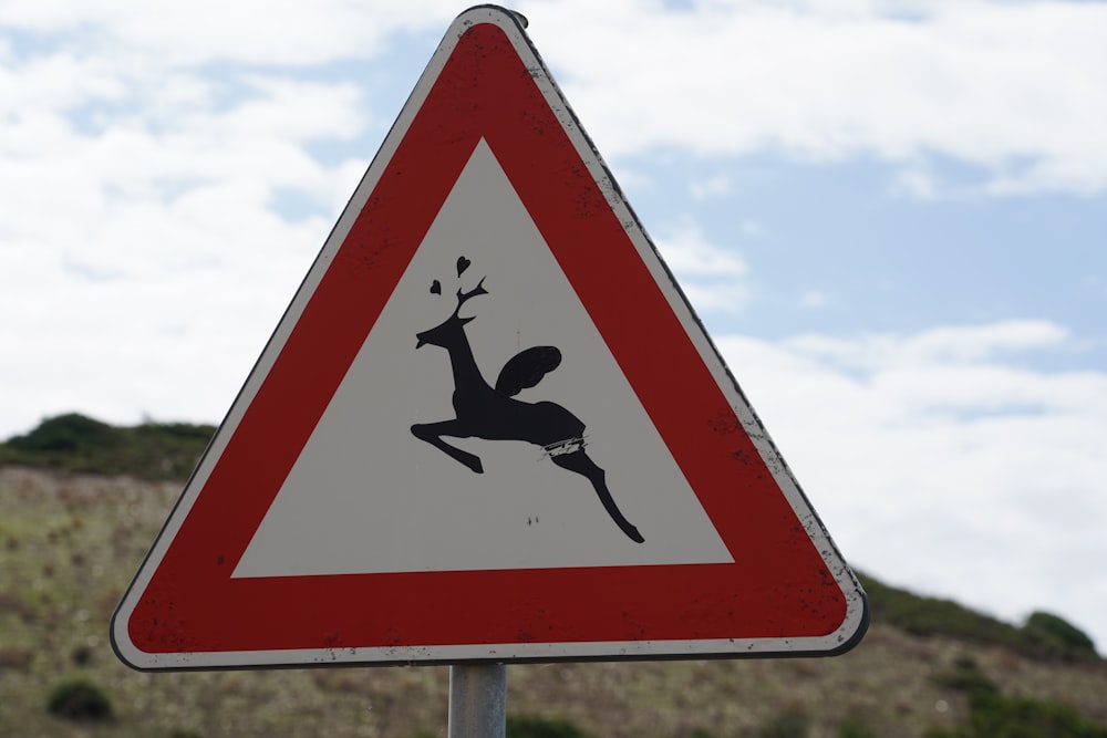 red and black road sign